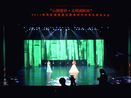 Singers on the stage during the show for Hunan immigrants in the main hall of the Hainan Centre for the Performing Arts