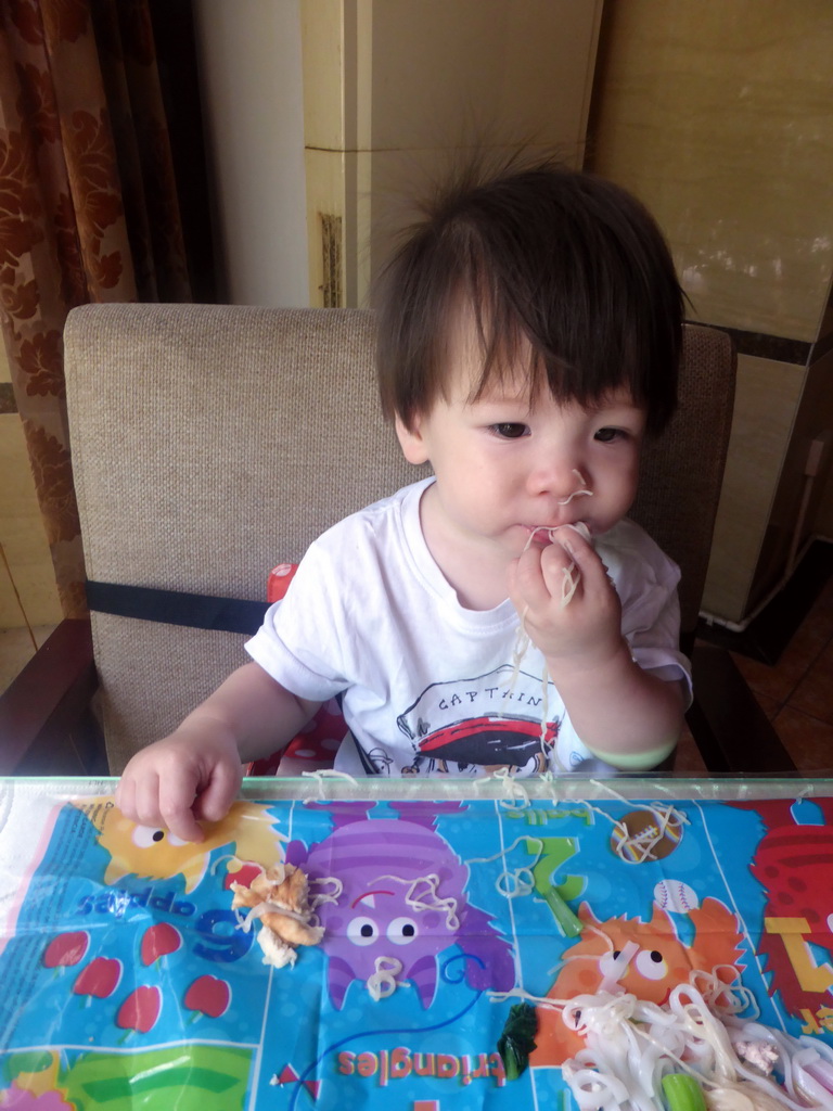 Max having breakfast in the restaurant of our hotel at Qingnian Road