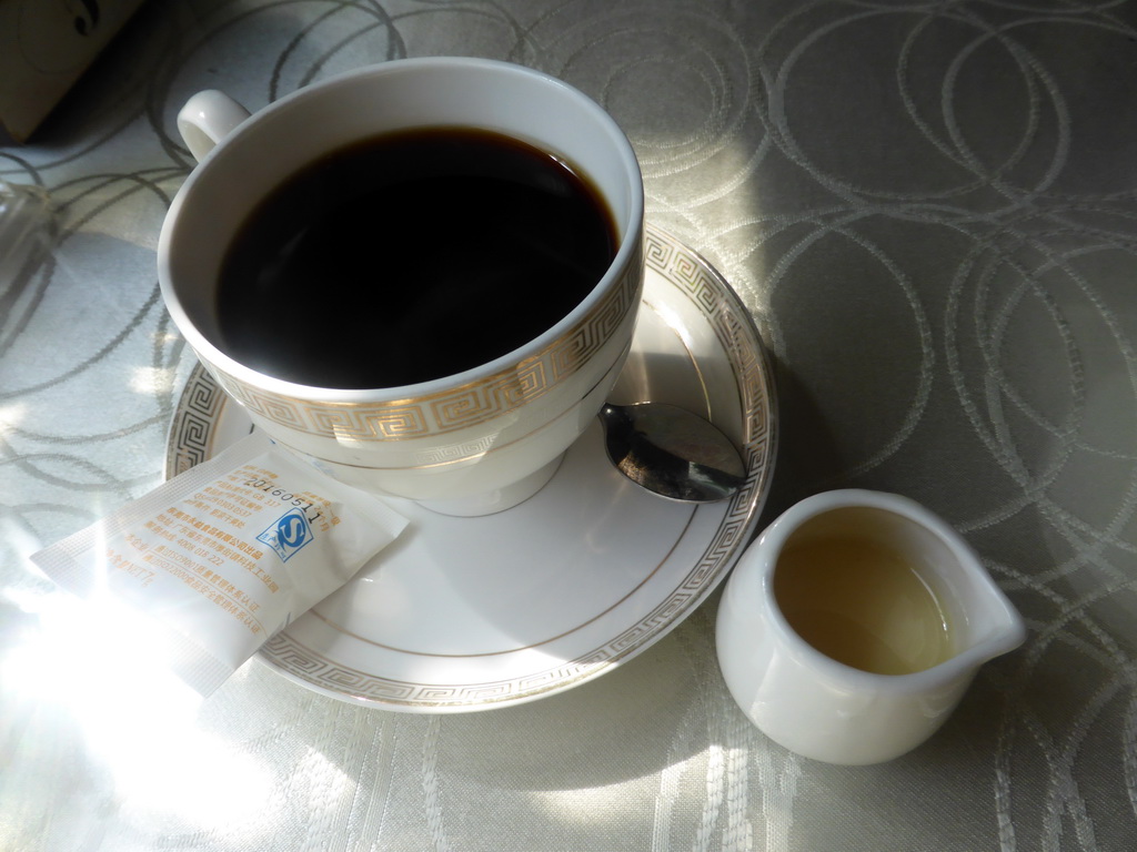 Coffee in the restaurant of our hotel at Qingnian Road