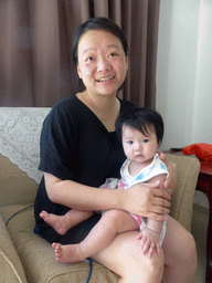 Miaomiao and Max`s cousin in our living room in the hotel at Qingnian Road