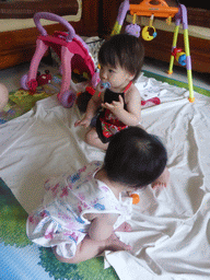 Max and his cousin in the apartment of Miaomiao`s sister