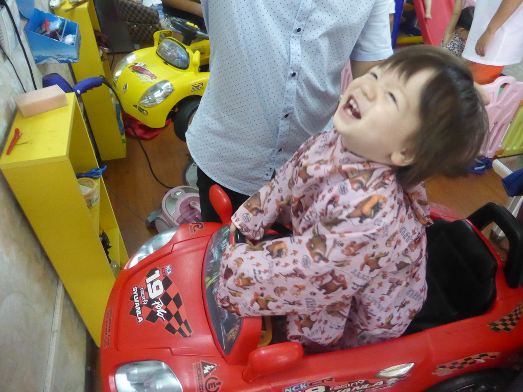 Max at the barber at Haifu Road