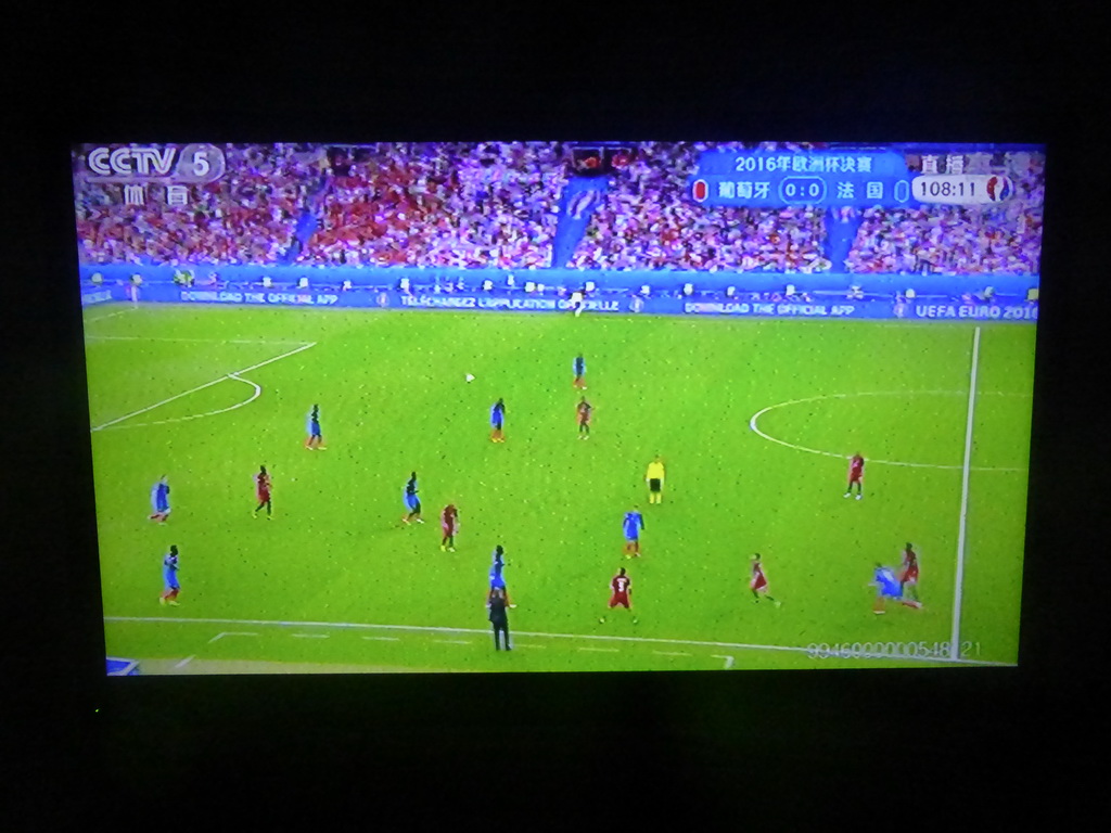 Television screen in our living room in the hotel at Qingnian Road, showing the final of the European Championship soccer 2016
