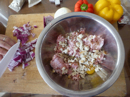 Meatballs being prepared in the apartment of Miaomiao`s sister