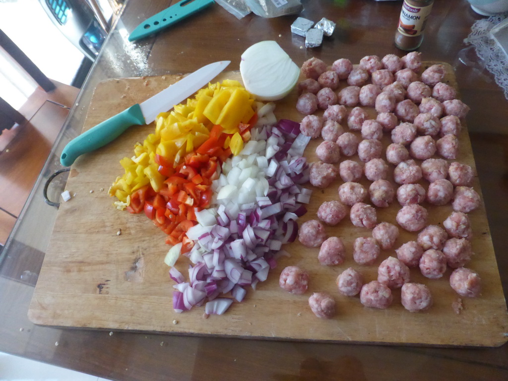 Meatballs being prepared in the apartment of Miaomiao`s sister