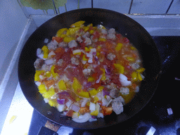 Meatballs being prepared in the apartment of Miaomiao`s sister