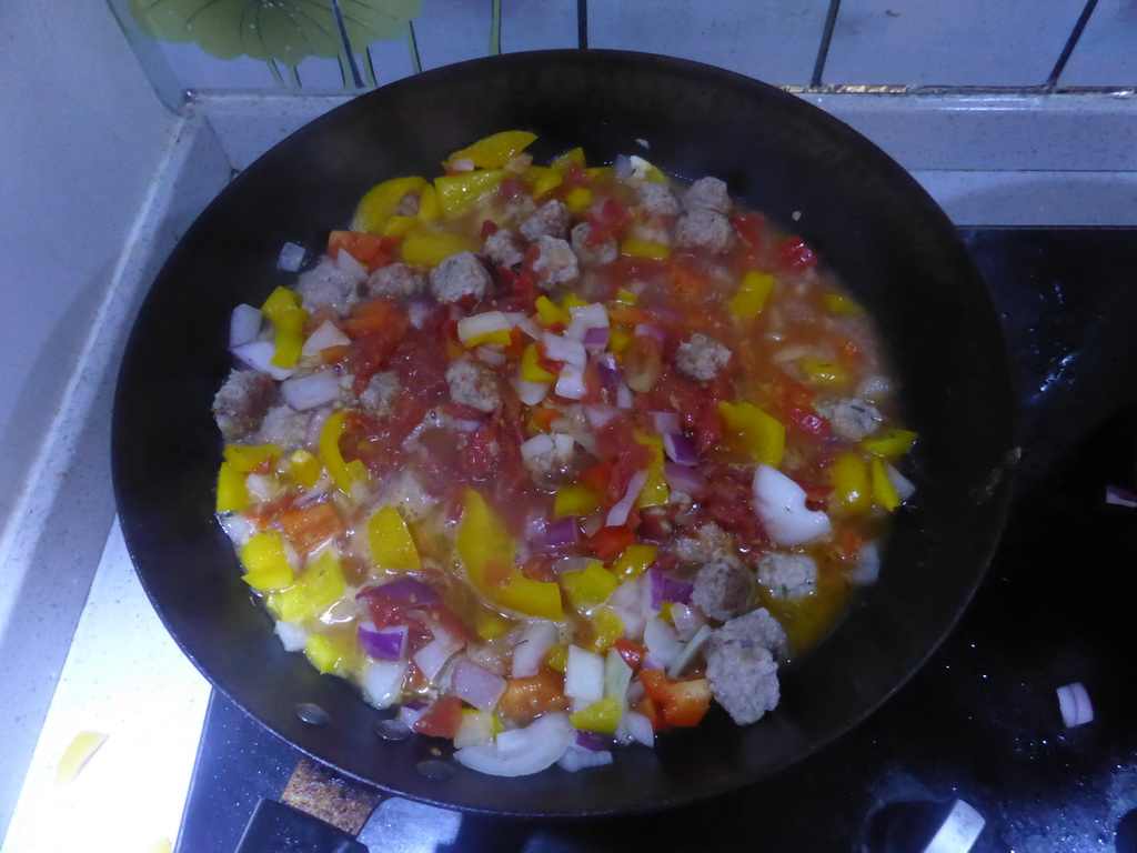 Meatballs being prepared in the apartment of Miaomiao`s sister