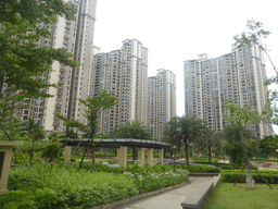 Buildings and central garden at the apartment complex of Miaomiao`s sister