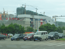 Building under construction at Yehai Avenue, viewed from the car