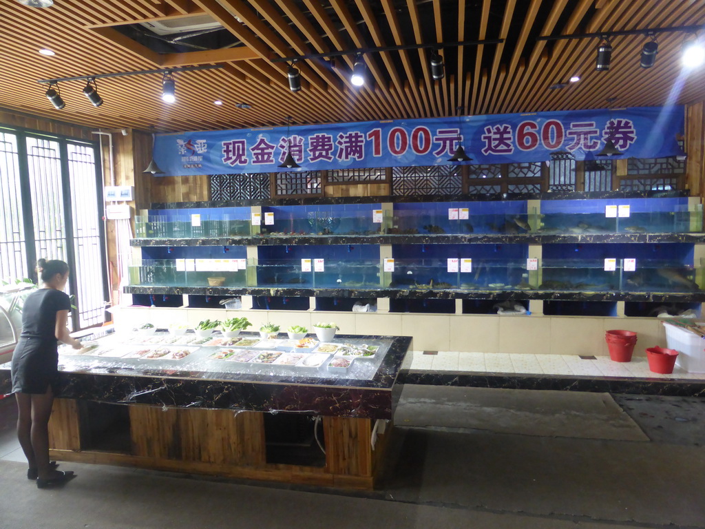Aquariums in the lobby of the Xinya Steam Pot restaurant