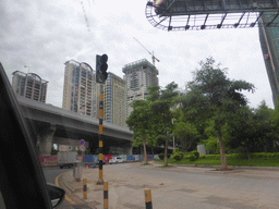 Buildings under construction at the crossing of Longkun South Road and Guoxing Avenue, viewed from the car