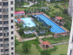 Swimming pool in the central garden of the apartment complex of Miaomiao`s sister, viewed from the balcony of the apartment of Miaomiao`s sister