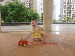 Max at the central square of the apartment complex of Miaomiao`s sister