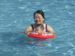 Max and Miaomiao at the swimming pool of the apartment complex of Miaomiao`s sister