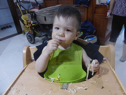 Max having dinner in the apartment of Miaomiao`s sister