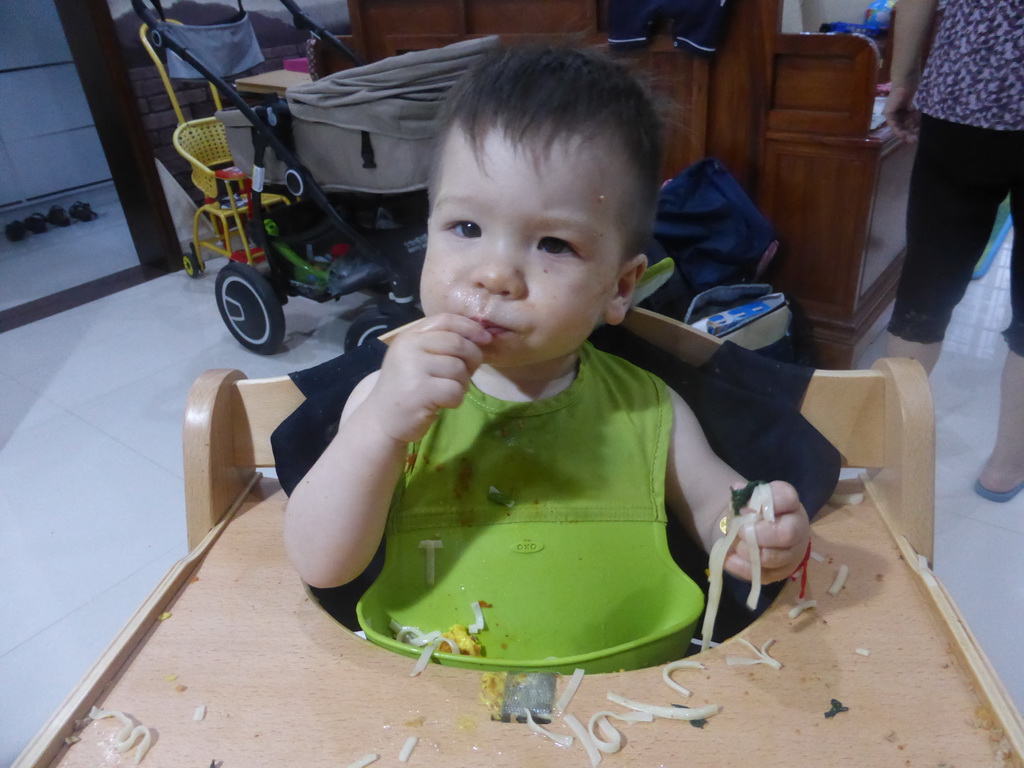 Max having dinner in the apartment of Miaomiao`s sister