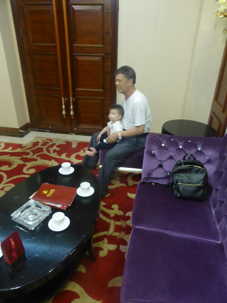 Max and Miaomiao`s father in the Jinghao Restaurant at Bailong South Road