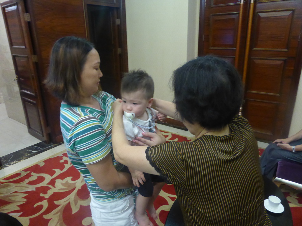 Max and Miaomiao`s family in the Jinghao Restaurant at Bailong South Road