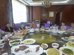 Miaomiao, Max and Miaomiao`s family in the Jinghao Restaurant at Bailong South Road