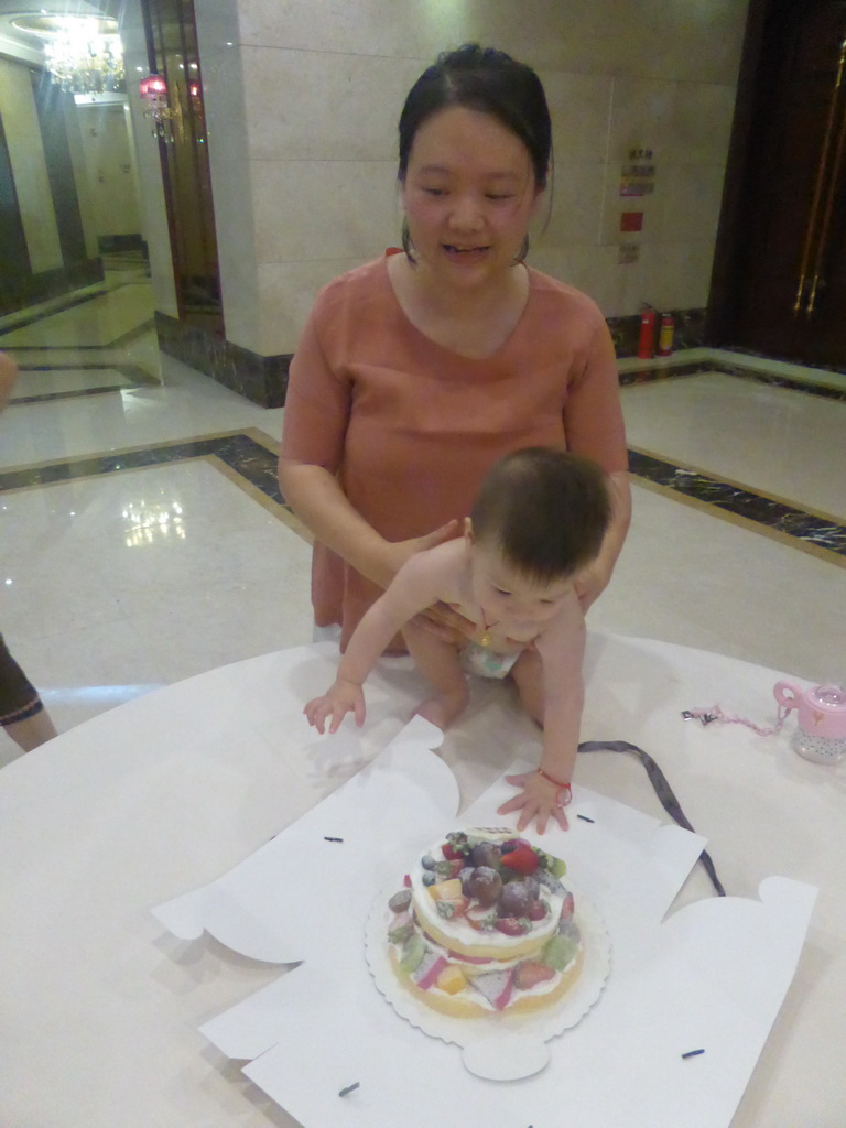 Miaomiao and Max with his birthday cake in the Jinghao Restaurant at Bailong South Road