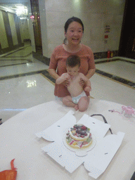 Miaomiao and Max with his birthday cake in the Jinghao Restaurant at Bailong South Road