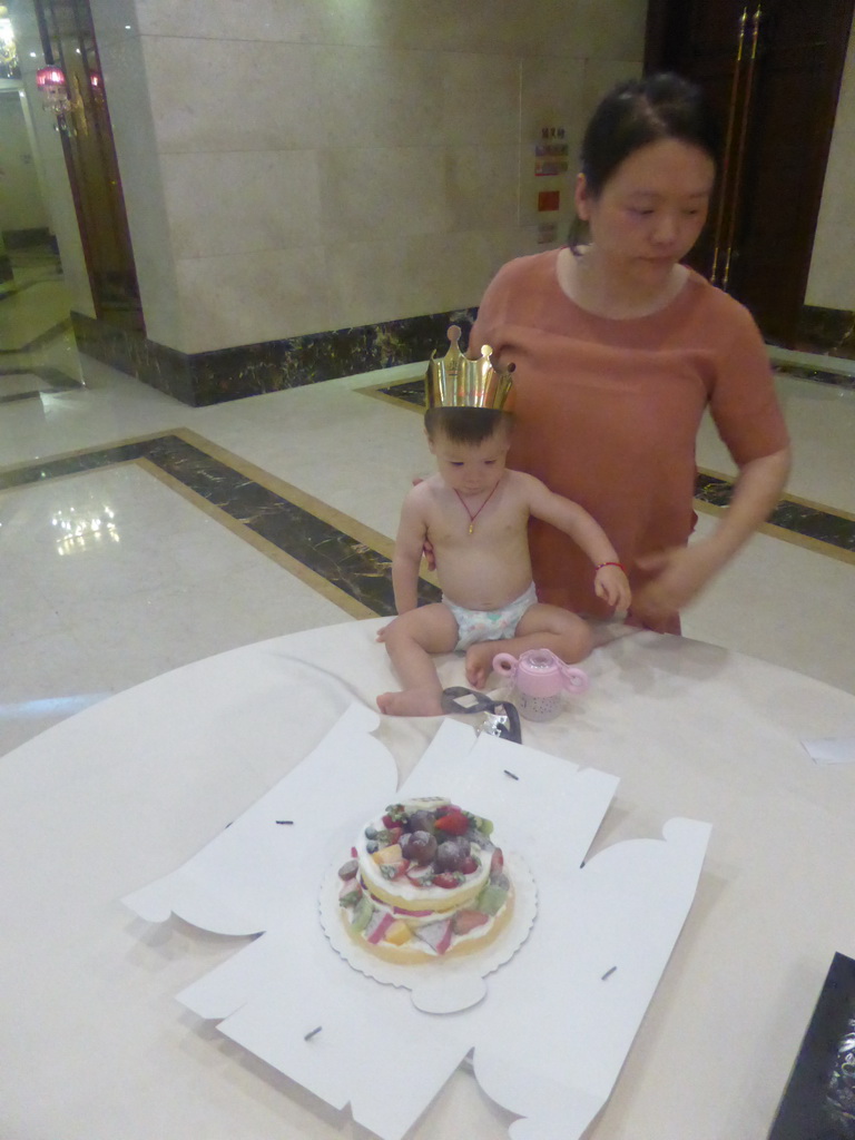 Miaomiao and Max with his birthday cake in the Jinghao Restaurant at Bailong South Road