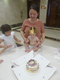 Miaomiao, Max and Miaomiao`s family with Max`s birthday cake in the Jinghao Restaurant at Bailong South Road