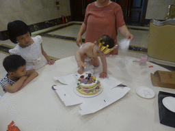 Miaomiao, Max and Miaomiao`s family with Max`s birthday cake in the Jinghao Restaurant at Bailong South Road