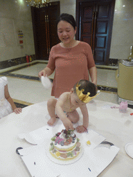 Miaomiao and Max with his birthday cake in the Jinghao Restaurant at Bailong South Road