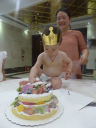 Miaomiao and Max with his birthday cake in the Jinghao Restaurant at Bailong South Road