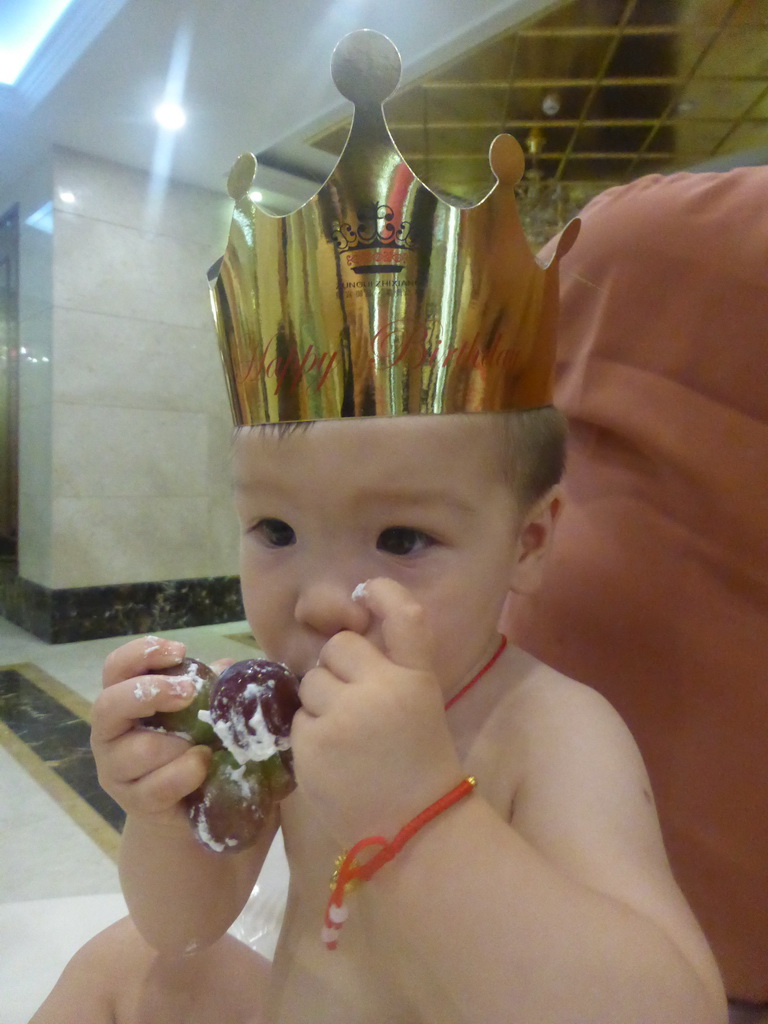 Max eating his birthday cake in the Jinghao Restaurant at Bailong South Road