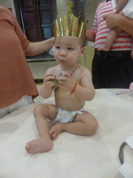 Max eating his birthday cake in the Jinghao Restaurant at Bailong South Road