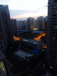 Apartment buildings, viewed from the balcony of the apartment of Miaomiao`s sister, at sunset