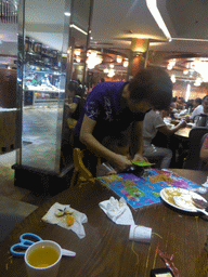 Max and Miaomiao`s mother having breakfast in a restaurant at Lantian Road