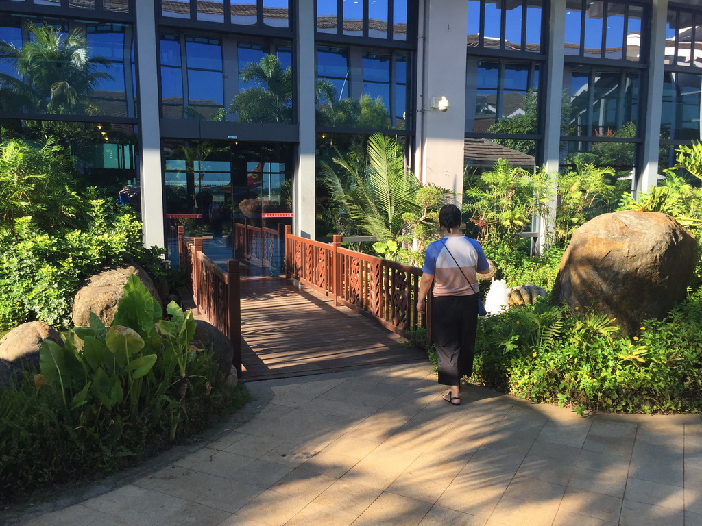 Miaomiao in the outdoor garden at Haikou Meilan International Airport