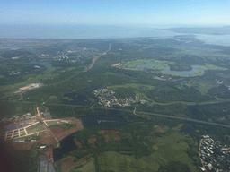 The Hainan Meilan Golf Club, Puqiangang Bay and Dongzhai Harbour, viewed from the airplane to Bangkok