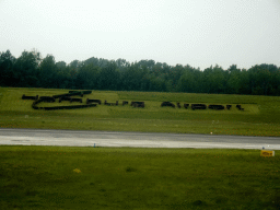 Logo of Hamburg Airport in the grass, viewed from the airplane from Amsterdam