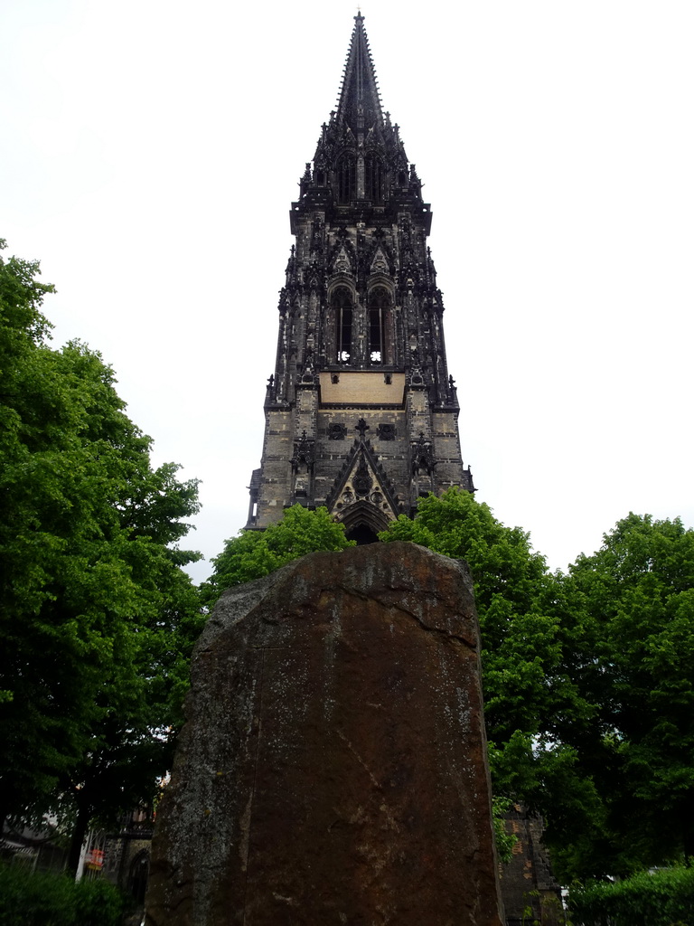 Rock at the Hopfenmarkt square and the west side of the tower of the St. Nikolai Memorial