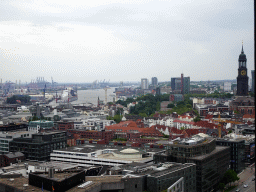 The southwest side of the city with the St. Michael`s Church, the Elbe river and the Hamburg harbour, viewed from the tower of the St. Nikolai Memorial