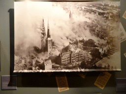 Photograph of the destruction of the city of Lübeck, at the Museum of the St. Nikolai Memorial, with explanation
