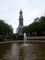 Fountain at the Michielwiese park and the south side of St. Michael`s Church