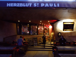 Front of the Herzblut St. Pauli restaurant at the Reeperbahn street, at sunset