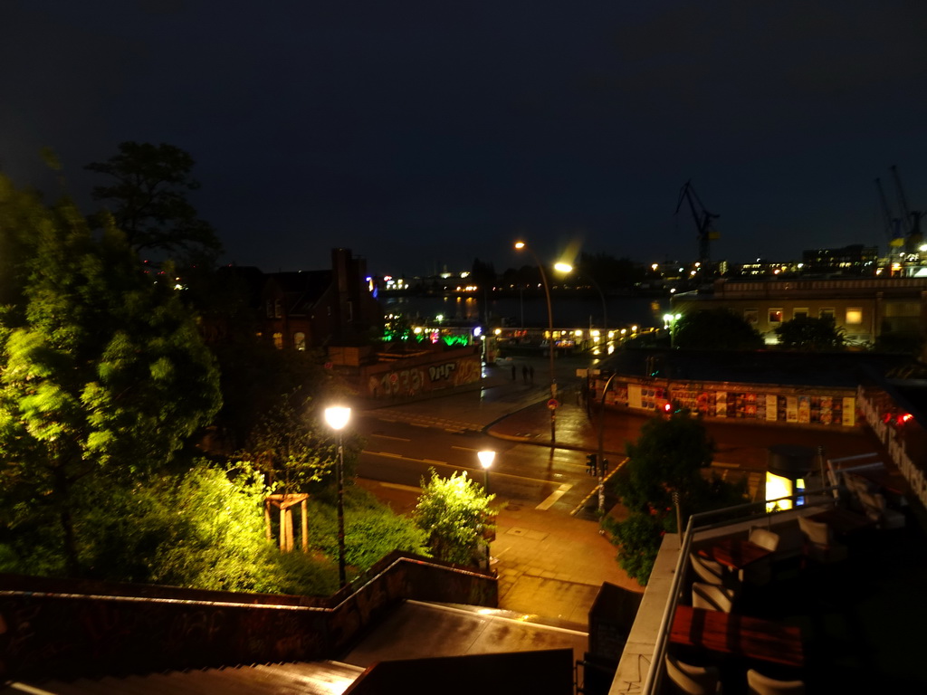 The Elbe river and the St. Pauli Piers, viewed from the Davidstraße street, by night