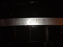 `Hey Jude` carved in stone at the Beatles Platz square, by night