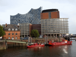 The Niederhafen harbour, the Elbe river, the Harbor Police Station No. 2, the Kehrwiederspitze building and the Elbphilharmonie concert hall, viewed from the Elbpromenade