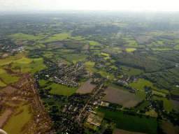 Grasslands and houses on the north side of the city, viewed from the airplane to Amsterdam