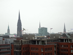 hamburg_1_296 - 225 kb - 1024x768 - Northeast side of the city with the towers of the City Hall, the St. Nikolai Memorial, St. Peters Church`and St. James` Church, viewed from the viewing point of the Elbphilharmonie concert hall Northeast side of the city with the towers of the City Hall, the St. Nikolai Memorial, St. Peters Church`and St. James` Church, viewed from the viewing point of the Elbphilharmonie concert hall