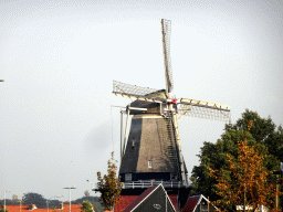 The De Hoop windmill at the Havendijk street, viewed from the Strandboulevard Oost