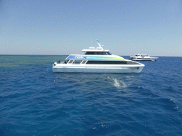 Boats and Hastings Reef, viewed from our Seastar Cruises tour boat