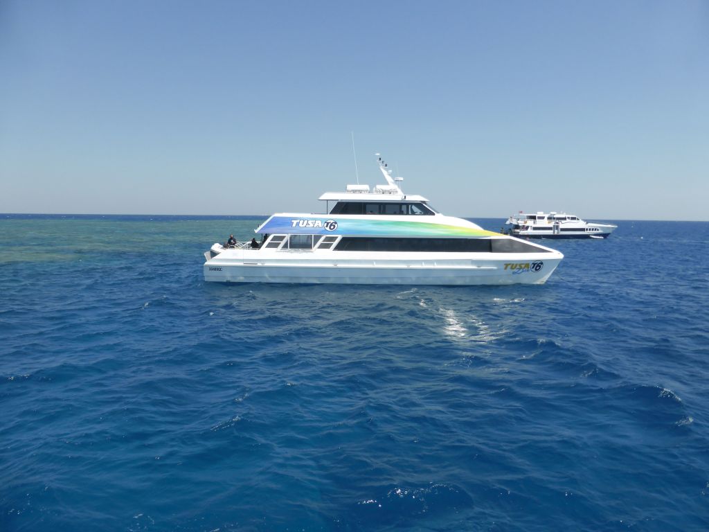 Boats and Hastings Reef, viewed from our Seastar Cruises tour boat